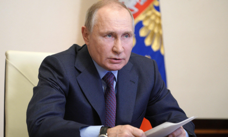 Russian President Vladimir Putin chairs a meeting on the coronavirus disease vaccines production via a video link at the Novo-Ogaryovo state residence outside Moscow. — AFP