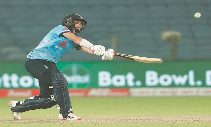 PUNE: England all-rounder Sam Curran hits out during the third One-day International against India at the Maharashtra Cricket Association Stadium on Sunday.&mdash;Reuters