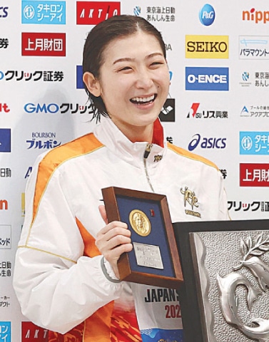 JAPANESE swimmer Rikako Ikee celebrates after winning the women’s 100-meter butterfly at the national championships at Aquatics Centre on Sunday.—AP