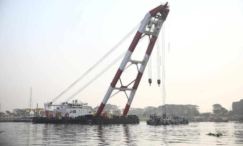 A rescue ship is seen at the site where several people died after a ferry collided with a cargo vessel and sank on Sunday in the Shitalakhsyaa River on April 5. — Reuters