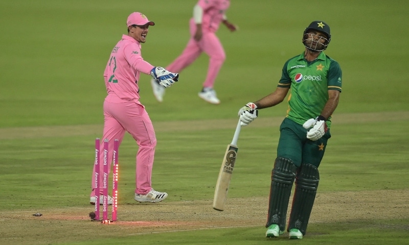 Fakhar Zaman (R) reacts after being run out by South Africa's Aiden Markram (not visible) as South African wicketkeeper Quinton de Kock (L) looks on during the second ODI between South Africa and Pakistan at Wanderers Stadium in Johannesburg on April 4. &mdash; AFP