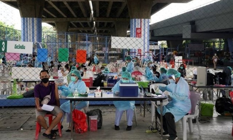 People receive Sinovac's Covid-19 vaccine after hundreds of residents in the district tested positive for the coronavirus in Bangkok, Thailand, April 7. — Reuters