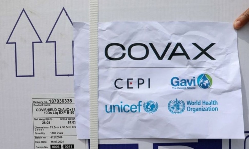Workers offload the AstraZeneca/Oxford vaccines under the Covax scheme at the Aden Abdulle Osman Airport in Mogadishu, Somalia, March 15. &mdash; Reuters
