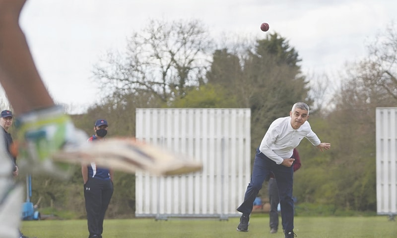 LONDON Mayor Sadiq Khan plays cricket during an election campaign visit to Kingstonian Cricket Club on Friday.—AFP