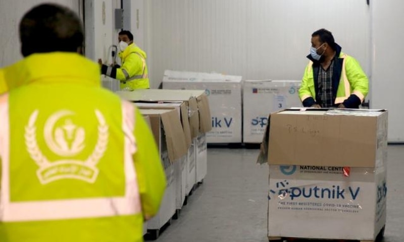 Workers unload a shipment of Russia's Sputnik V vaccine in Tripoli, Libya, April 4. — Reuters