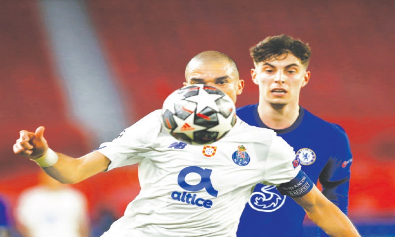 SEVILLE: FC Porto&rsquo;s Pepe (L) vies for the ball with Christian Pulisic of Chelsea during their Champions League quarter-final second leg at the Ramon Sanchez Pizjuan.&mdash;Reuters