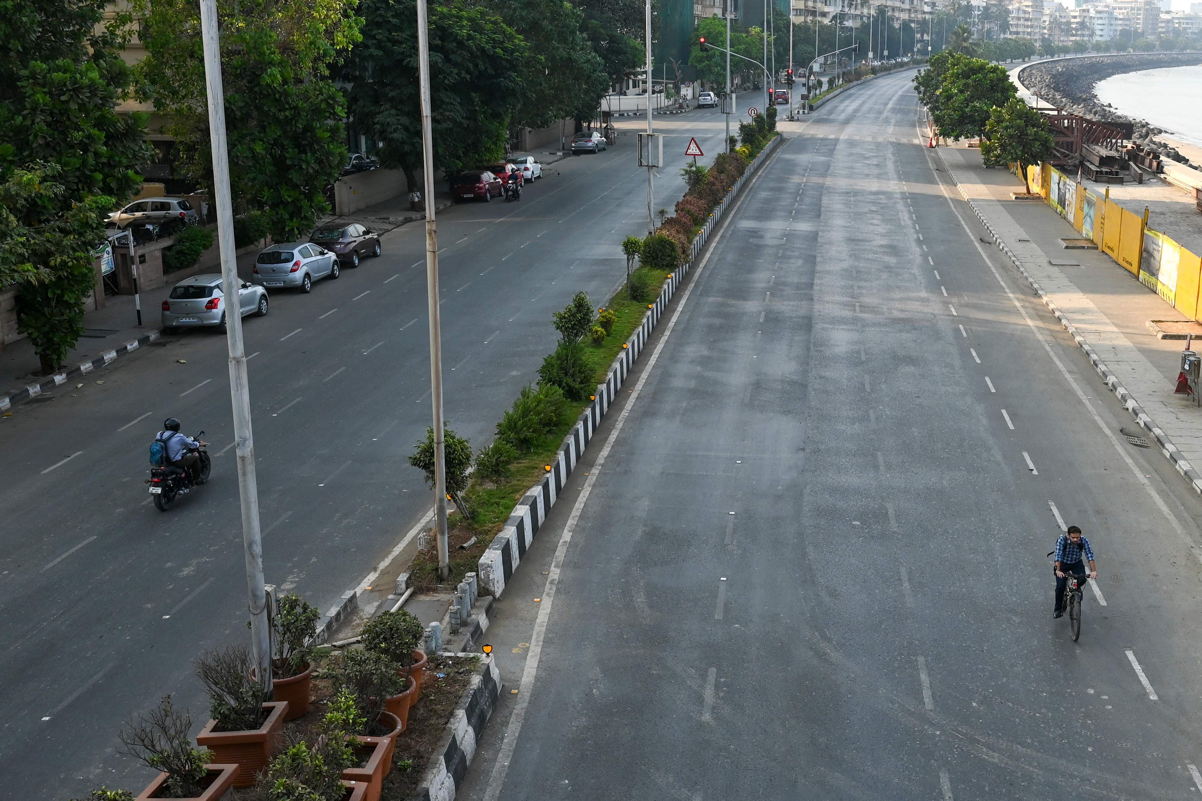 Deserted roads on Marine Drive are seen during restrictions imposed by the state government amidst rising coronavirus cases, in Mumbai on April 15. — AFP