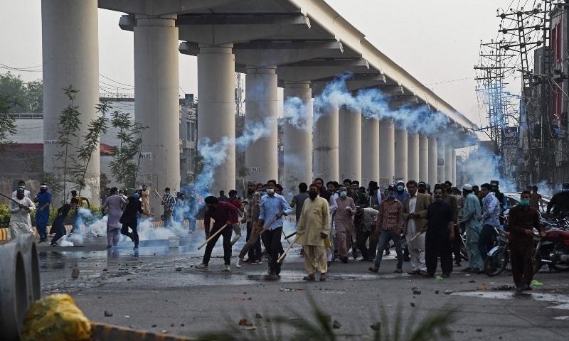 Police use tear gas to disperse supporters of Tehreek-i-Labbaik Pakistan (TLP) during a protest in Lahore. — AFP/File