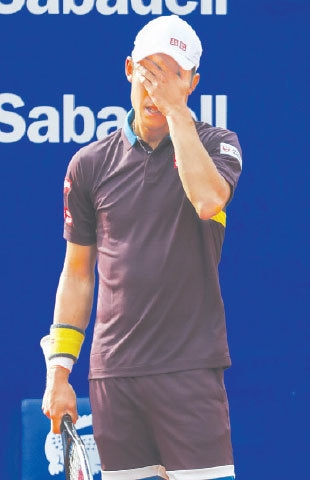 BARCELONA: Japan&rsquo;s Kei Nishikori reacts during his match against Rafael Nadal of Spain at the Barcelona Open.&mdash;AP
