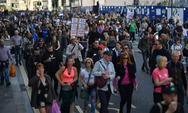 Demonstrators take part in an anti-lockdown, anti-Covid-19 vaccination passport, 'Unite for Freedom' protest in central London. — AFP