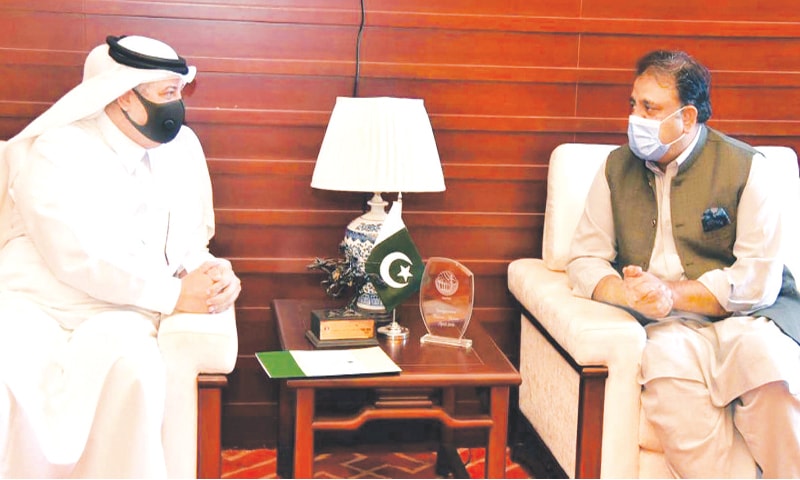 ISLAMABAD: Information and Broadcasting Minister Chaudhry Fawad Hussain speaks to Saudi Ambassador to Pakistan Nawaf bin Saeed Al-Maliki during the meeting.—PPI