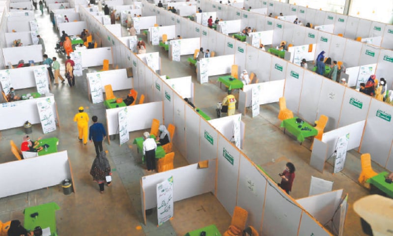 LAHORE: People being inoculated with the Chinese-made Sinopharm vaccine at the Expo Centre on Wednesday.—M. Arif Ali / White Star LAHORE: People being inoculated with the Chinese-made Sinopharm vaccine at the Expo Centre on Wednesday.—M. Arif Ali / White Star