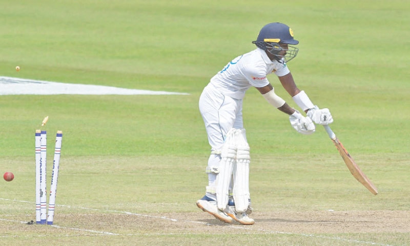 SRI LANKA’S Pathum Nissanka is bowled by Bangladesh seamer Taskin Ahmed during the second Test at the Pallekele International Cricket Stadium on Friday. — AFP