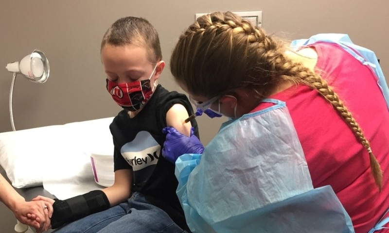 A child gets his Covid-19 vaccine as part of Moderna's pediatric vaccine trial in Salt Lake City, Utah, US on April 28. — Reuters