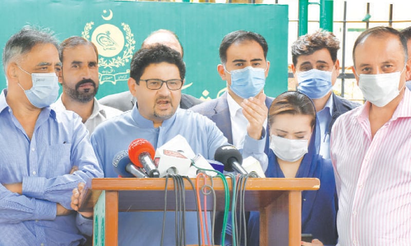 ISLAMABAD: Miftah Ismail addressing a press conference along with other PML-N leaders after a hearing by the Election Commission on his application on Tuesday.—Online ISLAMABAD: Miftah Ismail addressing a press conference along with other PML-N leaders after a hearing by the Election Commission on his application on Tuesday.—Online