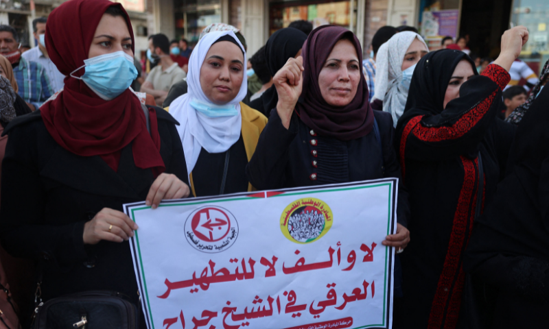 Supporters of the Popular Front for the Liberation of Palestine (PFLP) protest in Jabaliya in the northern Gaza Strip on Wednesday against an Israeli court's decision to evict several Palestinian families in the Sheikh Jarrah neighbourhood of occupied east Jerusalem. — AFP