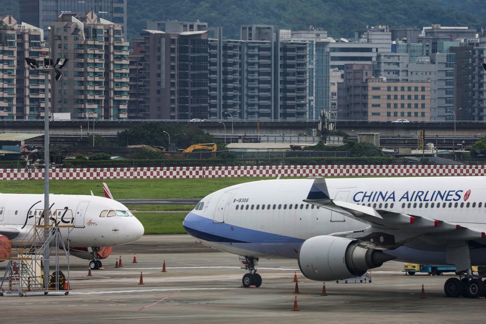Passenger jets of Taiwan's China Airlines at Taipei Songshan Airport in Taipei, Taiwan. &mdash; Reuters/File