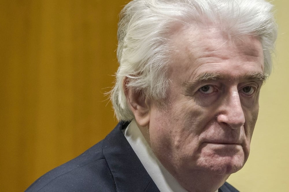 In this file photo taken on March 20, 2019, former Bosnian Serb leader Radovan Karadzic reacts at the court room of the International Residual Mechanism for Criminal Tribunals in The Hague. — AFP