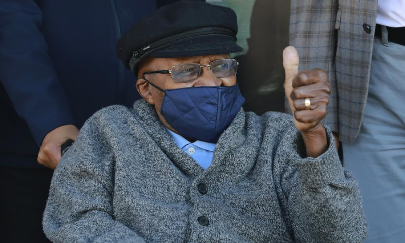 Anglican Archbishop Emeritus Desmond Tutu gestures after receiving a shot of the Covid-19 vaccine, at the Brooklyn Chest Hospital in Cape Town, South Africa. — AP