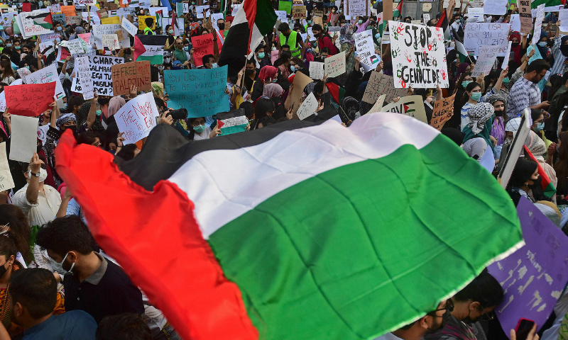 Demonstrators take part in a protest rally against Israel's attacks on the Gaza Strip in Karachi on Wednesday. — AFP