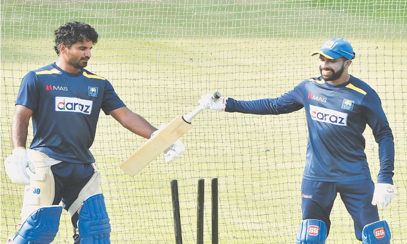 DHAKA: Sri Lanka captain Kusal Perera (L) and team-mate Niroshan Dickwella enjoy a light moment during a practice session at the Sher-e-Bangla National Cricket Stadium on Thursday as the tourists continue their preparations for the upcoming One-day International series against Bangladesh, beginning from Sunday.—AFP DHAKA: Sri Lanka captain Kusal Perera (L) and team-mate Niroshan Dickwella enjoy a light moment during a practice session at the Sher-e-Bangla National Cricket Stadium on Thursday as the tourists continue their preparations for the upcoming One-day International series against Bangladesh, beginning from Sunday.—AFP