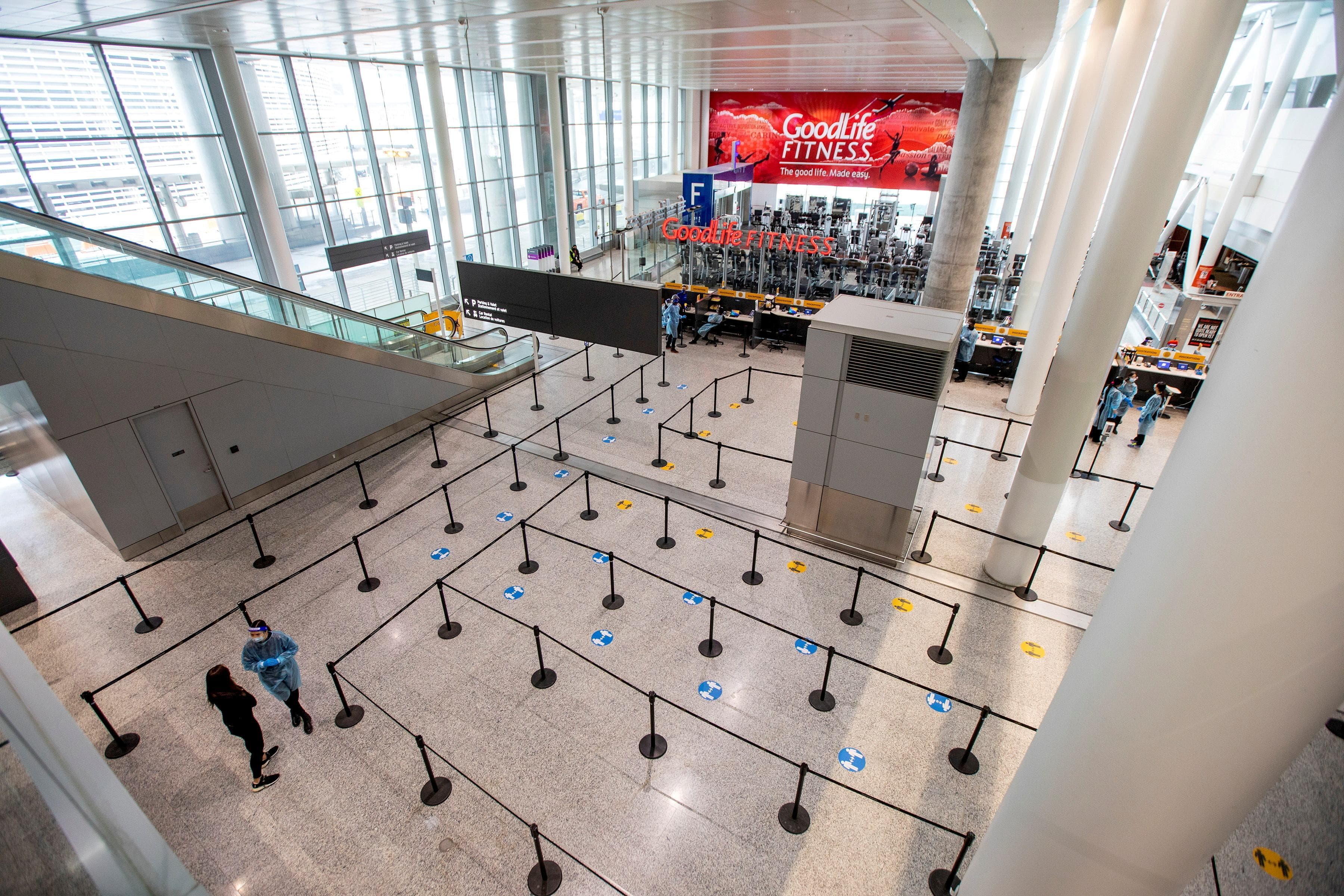 Healthcare workers prepare to test passengers before they arrive at Toronto's Pearson airport in Mississauga, Ontario, Canada, February 15, 2021. — Reuters/File