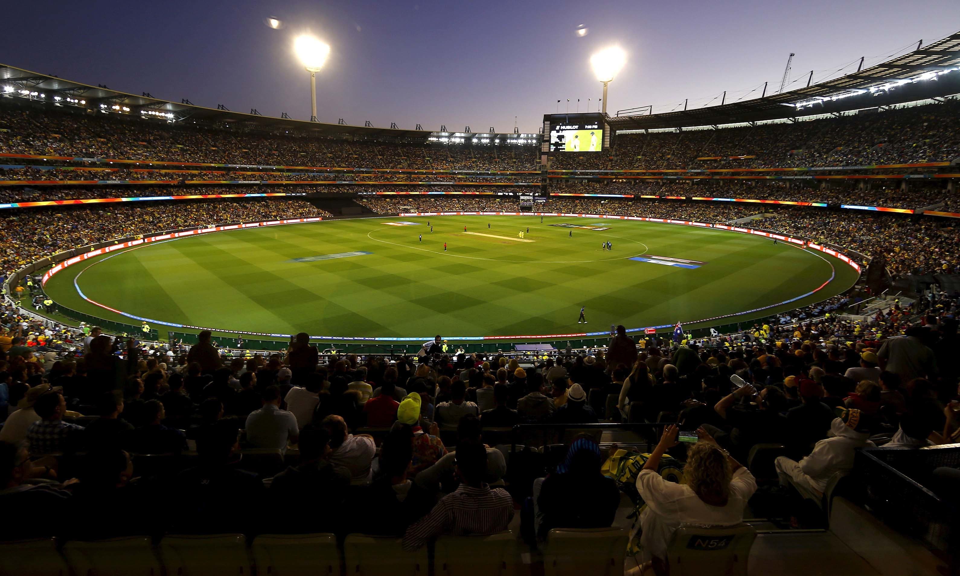 Members of the crowd watch as Australia and New Zealand play their Cricket World Cup final match at the Melbourne Cricket Ground (MCG) March 29, 2015. — Reuters