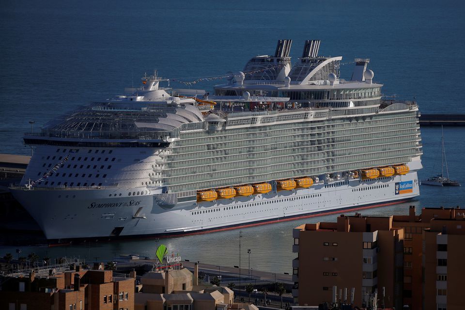 The world's largest cruise ship of Royal Caribbean Cruises, the 362-metre-long Symphony of the Seas during its world presentation ceremony, berthed at a port in Malaga, Spain. — Reuters/File