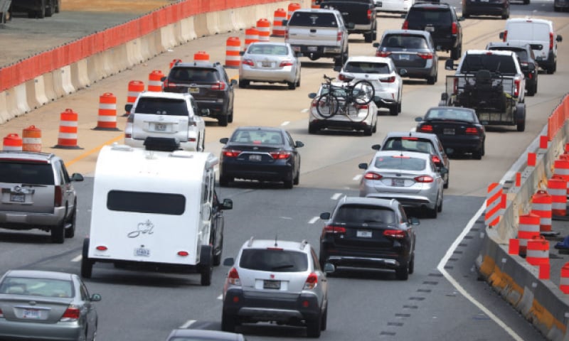 Heavy outgoing traffic moves toward the Chesapeake Bay Bridge on the eve of Memorial Day long weekend in Annapolis, Maryland, USA. As Covid-19 related restrictions loosen up across the country, more than 37m Americans are expected to travel, either by driving, flying or catching a train, over the Memorial Day weekend this year, according to American Automobile Association.—AFP Heavy outgoing traffic moves toward the Chesapeake Bay Bridge on the eve of Memorial Day long weekend in Annapolis, Maryland, USA. As Covid-19 related restrictions loosen up across the country, more than 37m Americans are expected to travel, either by driving, flying or catching a train, over the Memorial Day weekend this year, according to American Automobile Association.—AFP
