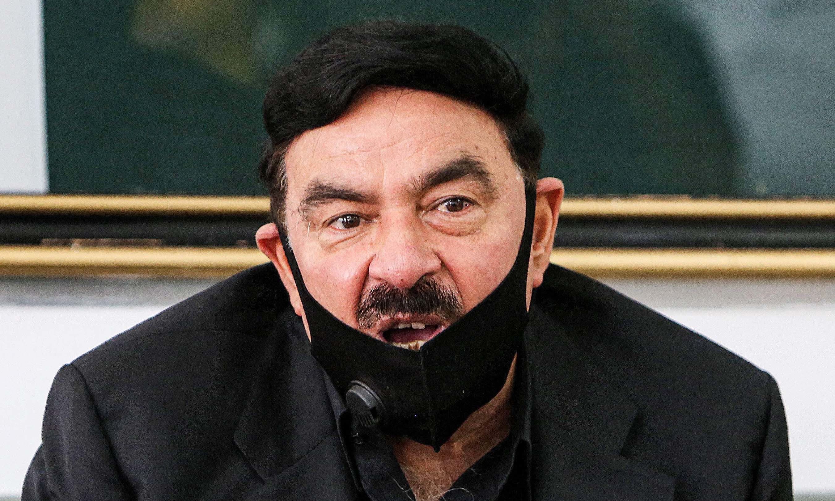 Interior Minister Sheikh Rasheed Ahmad speaks to reporters at the Pakistani embassy in Kuwait City on May 31. — AFP