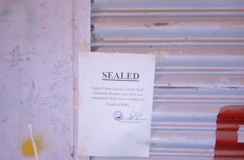 A shop in South district of Karachi after being sealed over Covid SOPs violation.