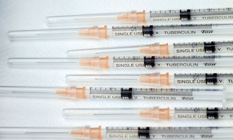 Syringes with doses of Covid-19 vaccine are displayed at the Tokyo Metropolitan Cancer and Infectious Diseases Center at Komagome Hospital in Tokyo. — Reuters