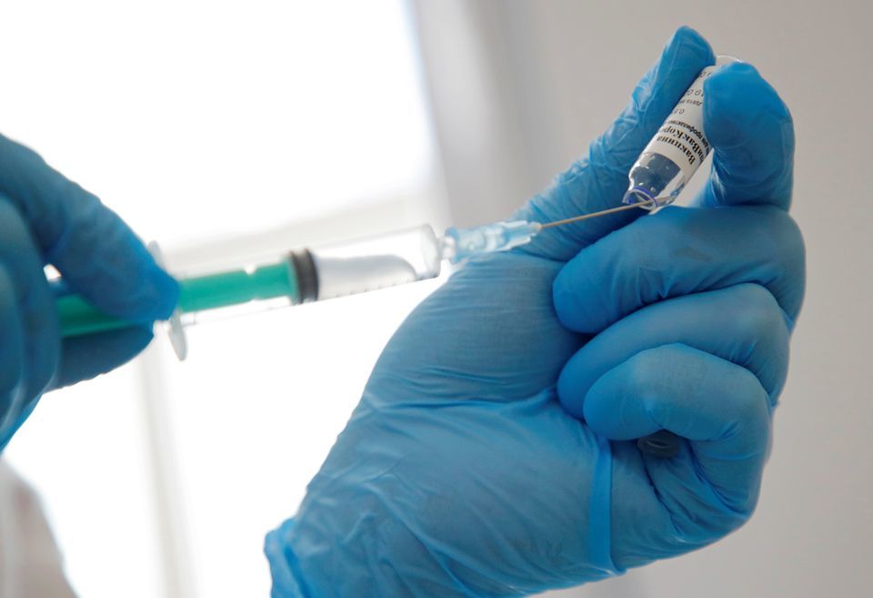 A medical worker fills a syringe with a dose of the EpiVacCorona vaccine at a local clinic in Saint Petersburg, Russia, April 12. — Reuters