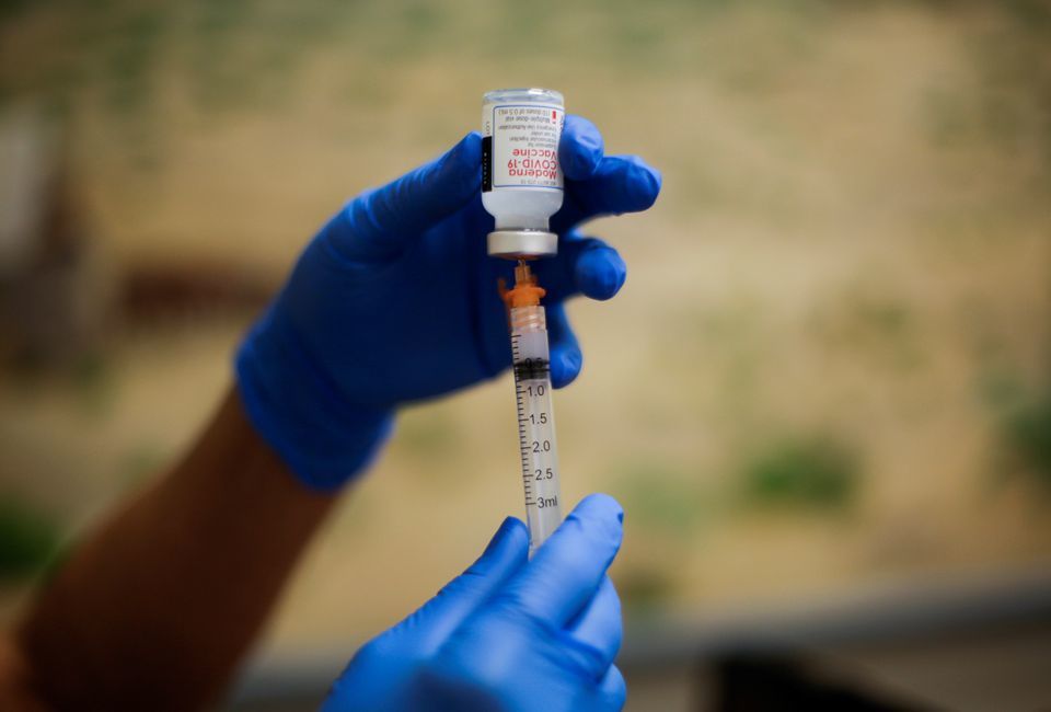 A healthcare worker prepares the Moderna vaccine against Covid-19 at a vaccination centre, in El Paso, Texas, US, May 6. — Reuters