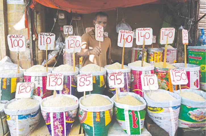 Different varieties of rice on sale in a city market on Thursday.—AFP