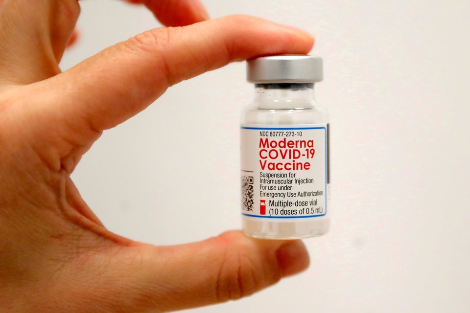 A healthcare worker holds a vial of the Moderna Covid-19 Vaccine at a pop-up vaccination site in Manhattan, New York City, New York, US. &mdash; Reuters/File