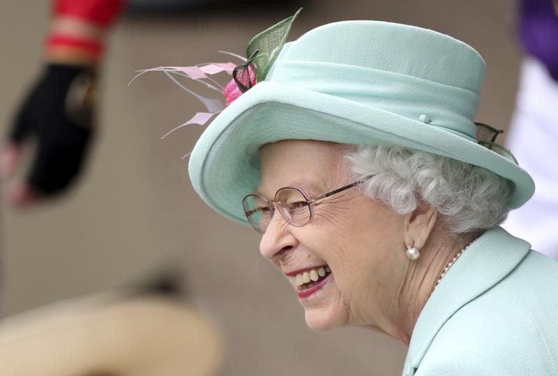 Queen Elizabeth II smiles, during day five of of the Royal Ascot horserace meeting, at Ascot Racecourse, in Ascot, England, June 19. — AP