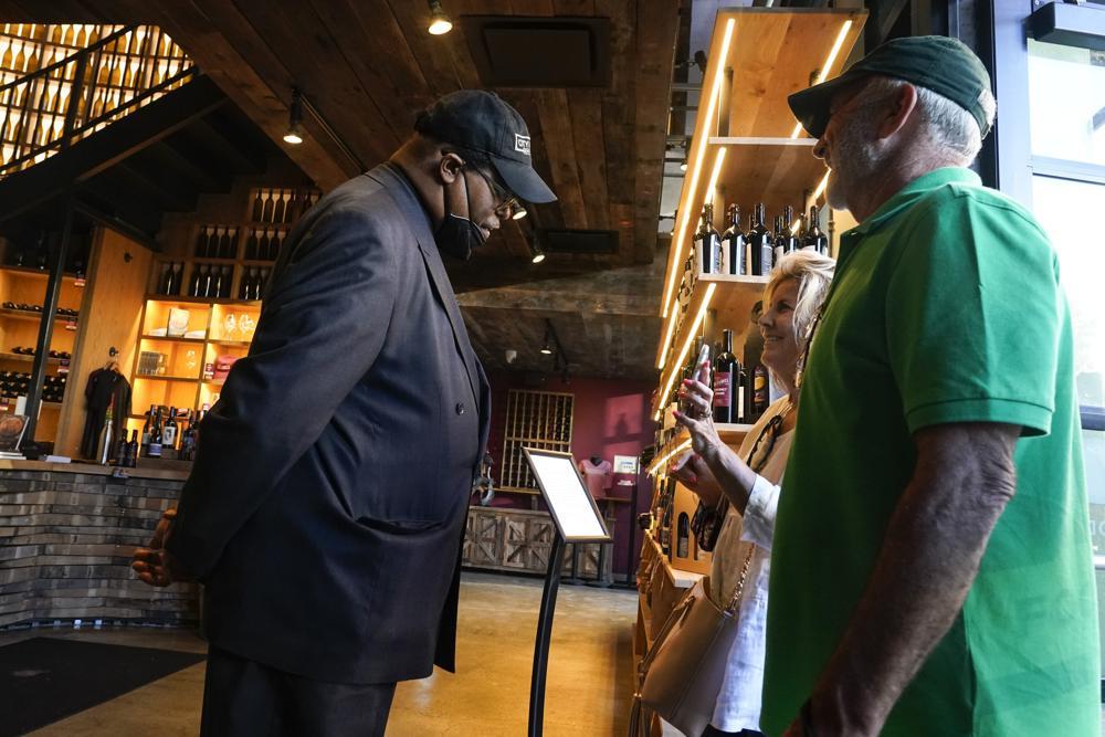 Security personnel ask customers for proof of vaccination as they enter City Winery, New York, US, June 24. &mdash; AP