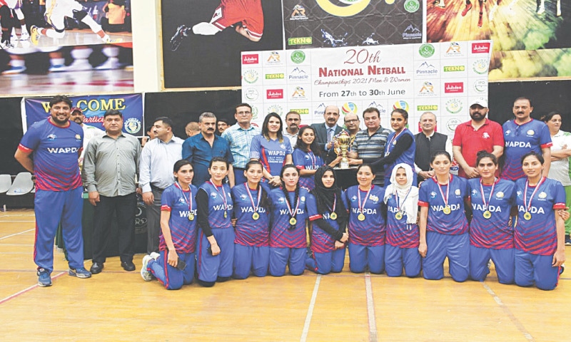 ISLAMABAD: Members of victorious Wapda women&rsquo;s netball team pose for a group photo after the final.