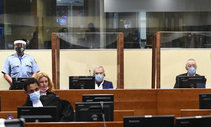 Former head of Serbia's state security service Jovica Stanisic (C) and former deputy head of Serbia's state security service, Franko “Frenki” Simatovic (R), appear in court at the UN International Residual Mechanism for Criminal Tribunals (IRMCT) in The Hague, on June 30. — AFP Former head of Serbia's state security service Jovica Stanisic (C) and former deputy head of Serbia's state security service, Franko “Frenki” Simatovic (R), appear in court at the UN International Residual Mechanism for Criminal Tribunals (IRMCT) in The Hague, on June 30. — AFP