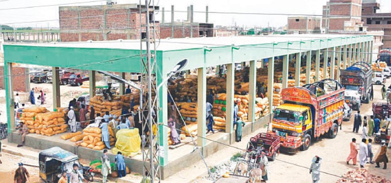 TRADING under way at the new sabzi mandi site.&mdash;Dawn