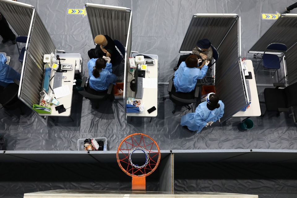 South Korean senior citizens receive their first dose of the Pfizer-BioNTech coronavirus vaccine at a vaccination centre in Seoul, South Korea, April 1. — Reuters