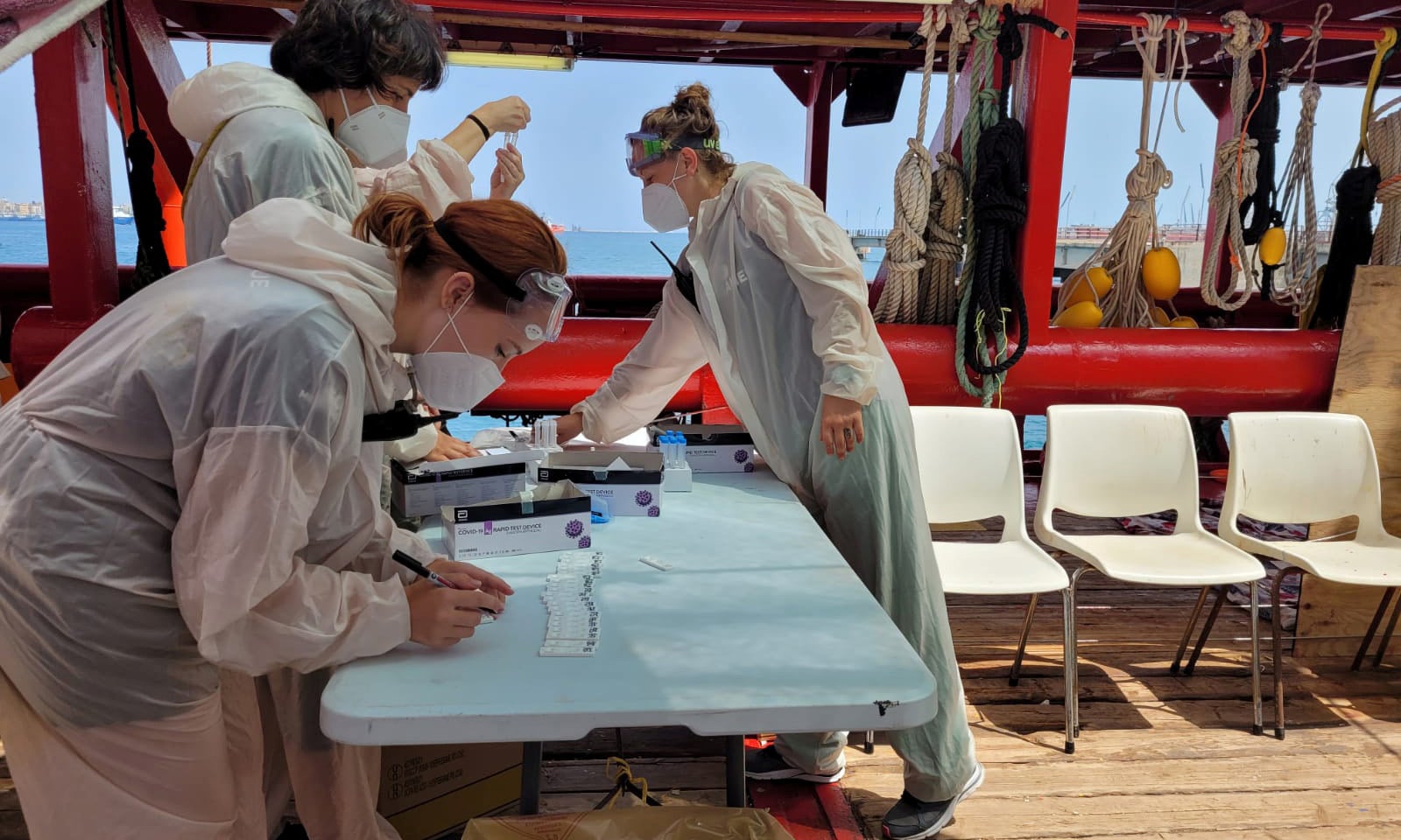 Healthcare workers perform tests for coronavirus onboard “Ocean Viking”, in Augusta, Sicily, Italy on Friday. — Reuters