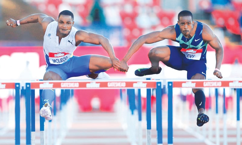 JAMAICA’S Ronald Levy (R) competes to win the men’s 110m hurdles ahead of compatriot Omar McLeod at the Gateshead Diamond League meeting.—Reuters JAMAICA’S Ronald Levy (R) competes to win the men’s 110m hurdles ahead of compatriot Omar McLeod at the Gateshead Diamond League meeting.—Reuters