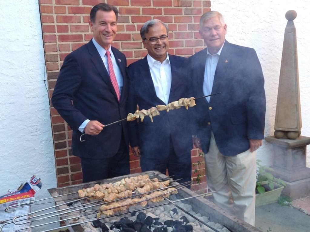 Congressman Tom Suozzi (L) and Congressman Pete Sessions (R) pictured with Ambassador Asad Majeed Khan (C). — Photo by author