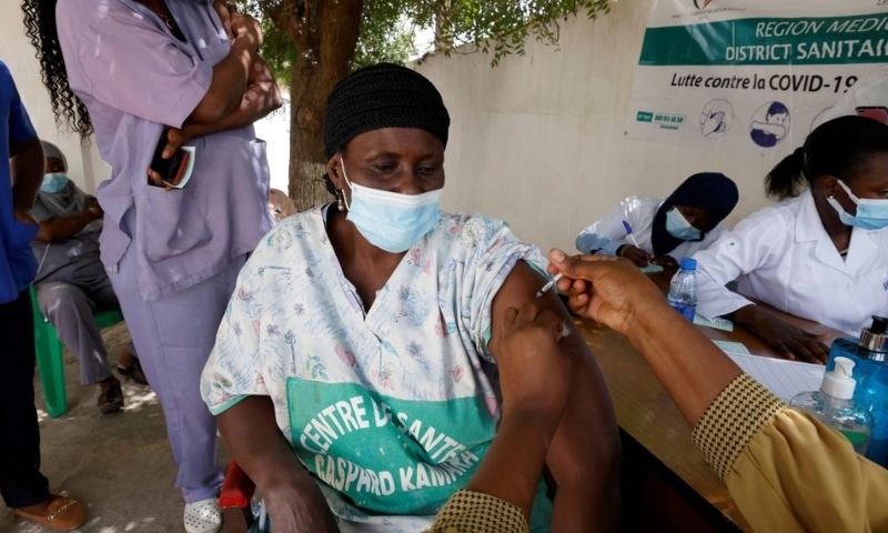 A health worker receives a dose of coronavirus vaccine in Dakar on February 24. &mdash; Reuters