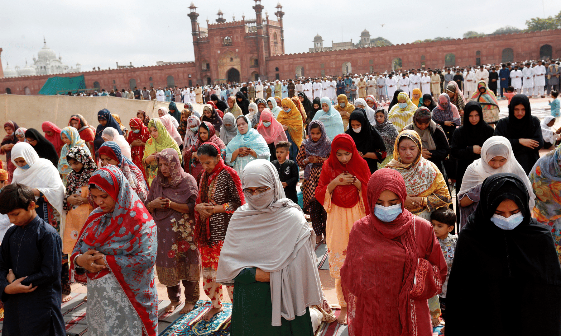 Women attend Eidul Azha prayers at the historical Badshahi mosque in Lahore. — AP