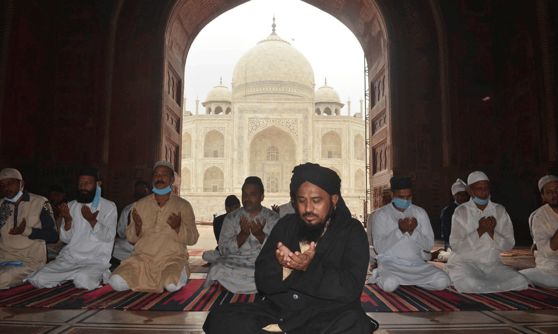 Muslims offer prayers in front of the Taj Mahal on Eidul Azha in Agra, India. — AP