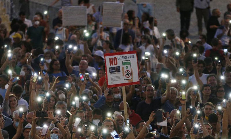 In this Wednesday, July 28, 2021 file photo, people stage a protest against the COVID-19 vaccination pass in Rome. — AP/File
