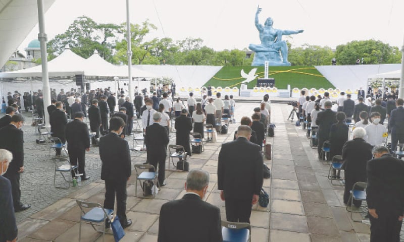 SILENT prayers being offered for victims of the US atomic bombing at Nagasaki Peace Park on Monday.&mdash;AP